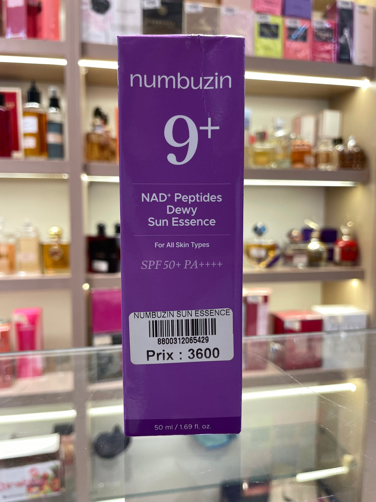 Numbuzin No.9+ NAD+ Peptides Dewy Sun Essence SPF50+ - Mirage Cosmétique Oran